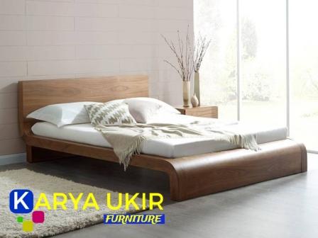 Ranjang simple minimalis atau yang biasa disebut dengan dipan kayu jati juga sebuah tempat tidur modern model terbaru