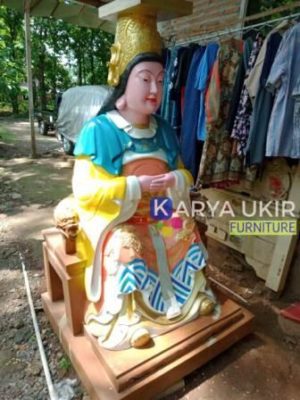 Patung sembahyang agama Budha yang terbuat dari bahan material kayu jati atau yang disebut dengan patung Buddha untuk kepercayaan tionghoa