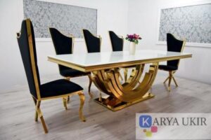 Meja makan stainless gold modern dengan desain terbaru atau yang biasa disebut dengan meja makan stainless dengan cat emas modern