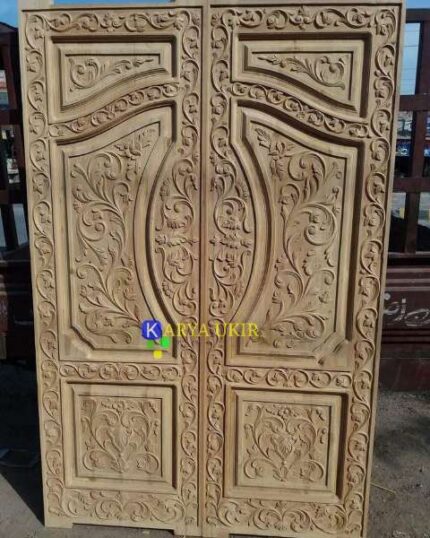 Pintu ukir Kupu Tarung klasik mewah dengan bahan material kayu jati atau yang biasa disebut dengan pintu ukiran hidup relief
